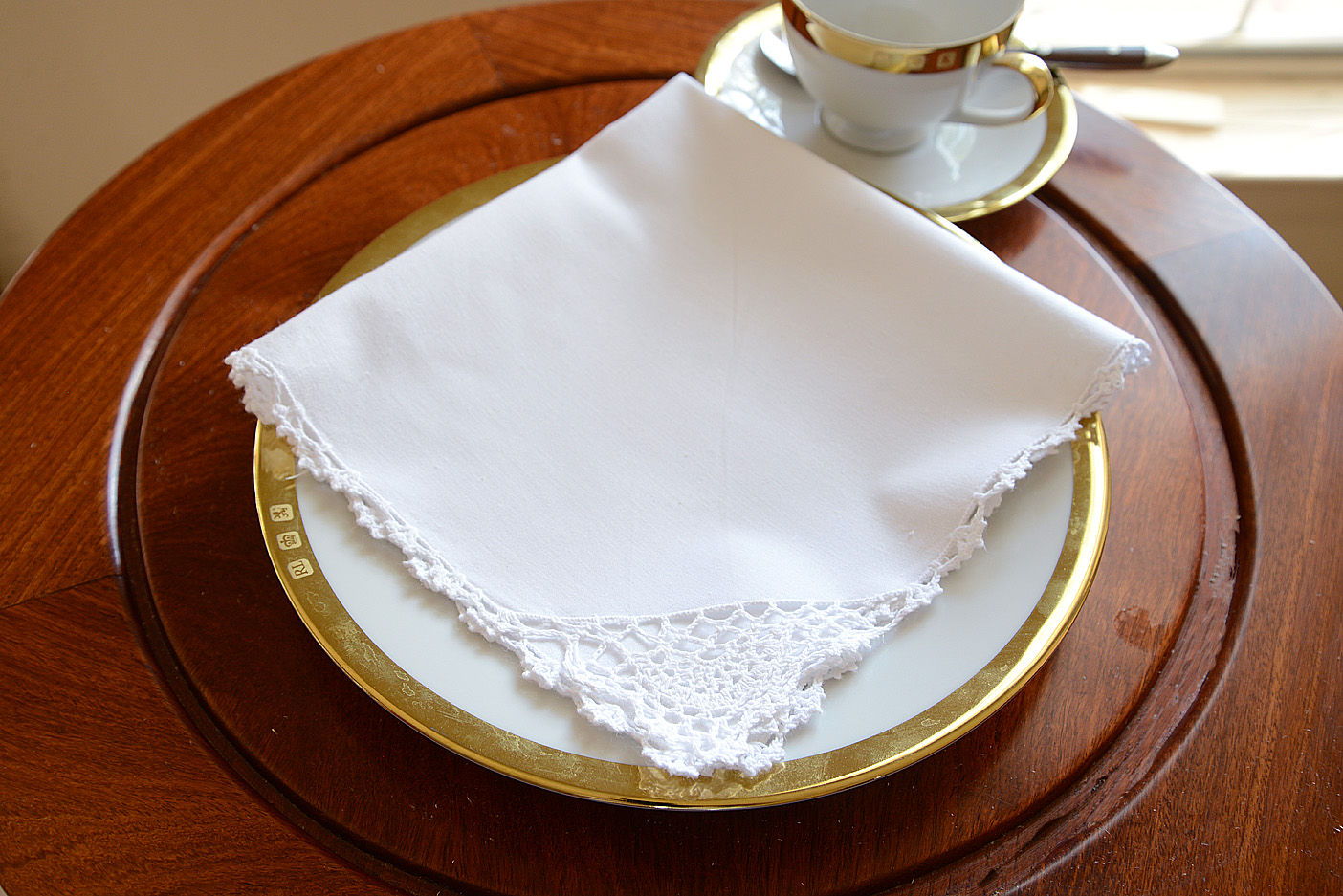 White cotton napkin crochet edges
